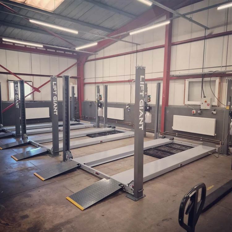 4-Post Parking Lift – Heavy-Duty Vehicle Storage & Service Solution four post parking lift