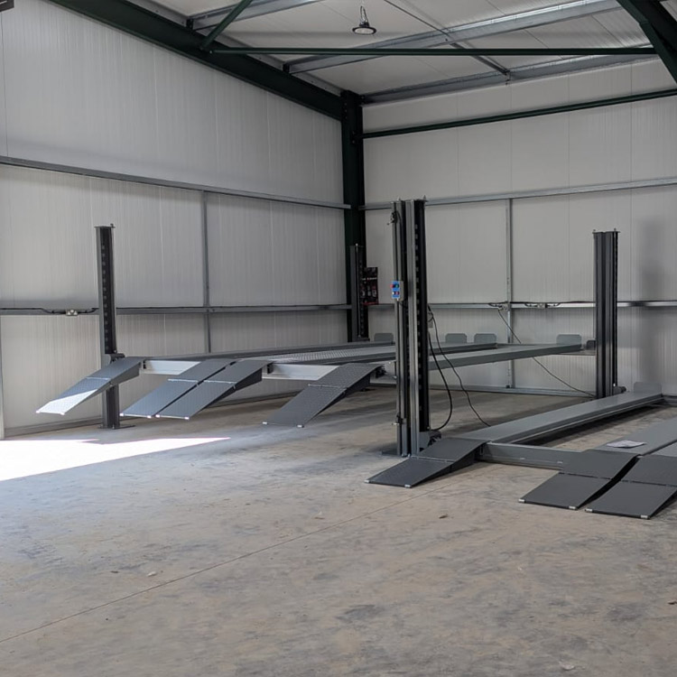 Double-Wide Car Park Lift – Dual-Vehicle Storage & Space-Saving System double wide four post lift