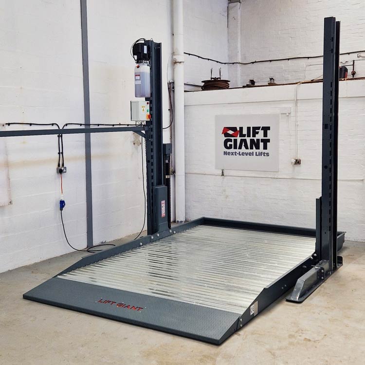 Two-Post Parking Lift | Space-Saving Vehicle Stacking System Two-post parking lift used for stacking vehicles and maximising garage space.